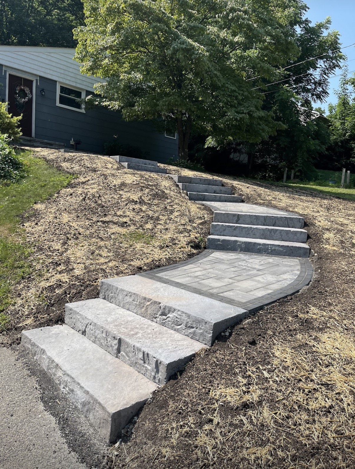 Custom stone steps installed by E&E Construction